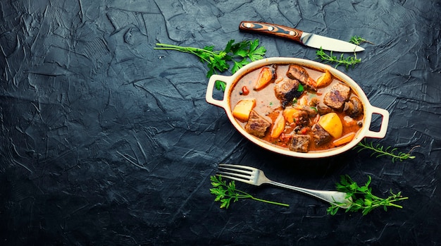 Stew with veal and mushrooms,space for text