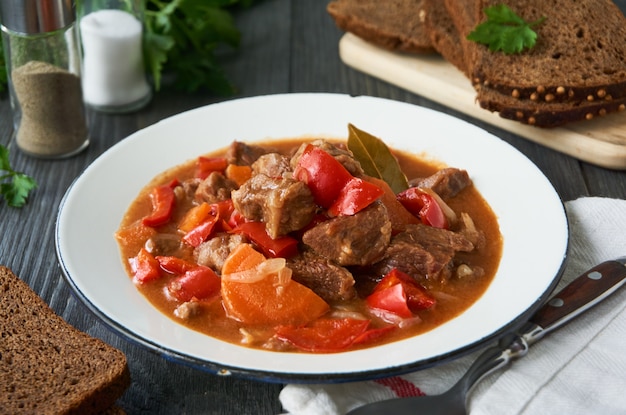 Stewed beef in tomato sauce with vegetables