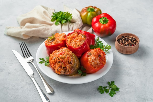 Stewed bell pepper stuffed with turkey meat rice and vegetables