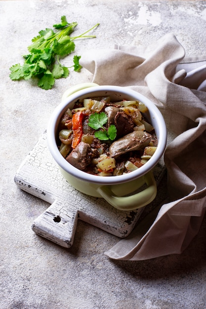 Stewed chicken liver with vegetables