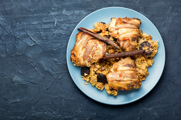 Stewed chicken thighs and porridge