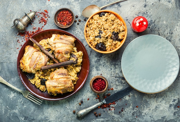 Stewed chicken thighs and porridge