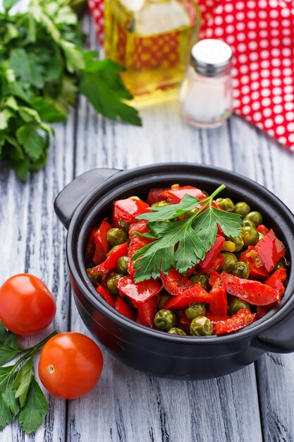 Stewed pepper, tomato and peas