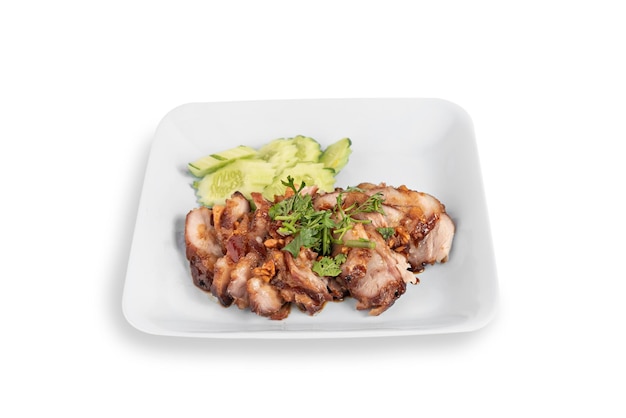 Stewed pork with herb and  vegetables on plate over white background