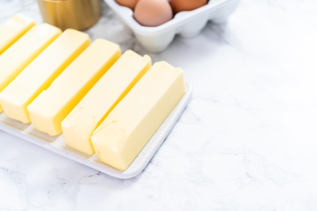 Sticks of butter at room temperature for baking.