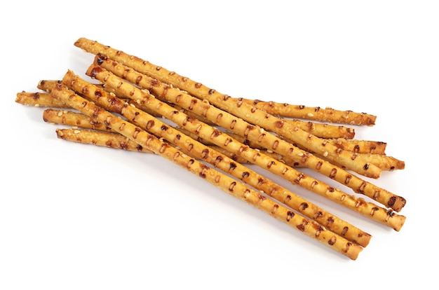 Sticks with sesame seeds on a white background close up