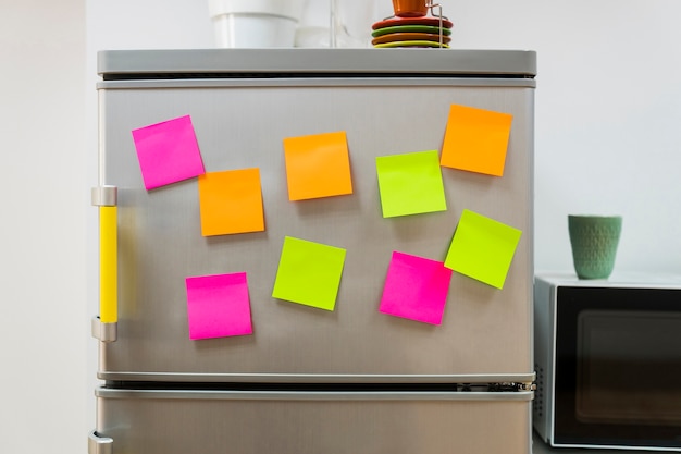 Photo sticky notes on fridge