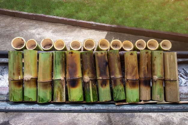 Sticky rice cooked in a bamboo tube by adding coconut milk and then burning until cookedKhao Lam is popular with Thai people