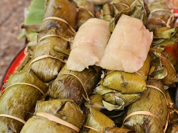 Sticky rice wrapped in banana leaves