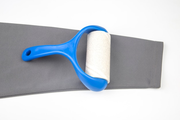 Sticky roller for cleaning clothes from dust, lint and hair