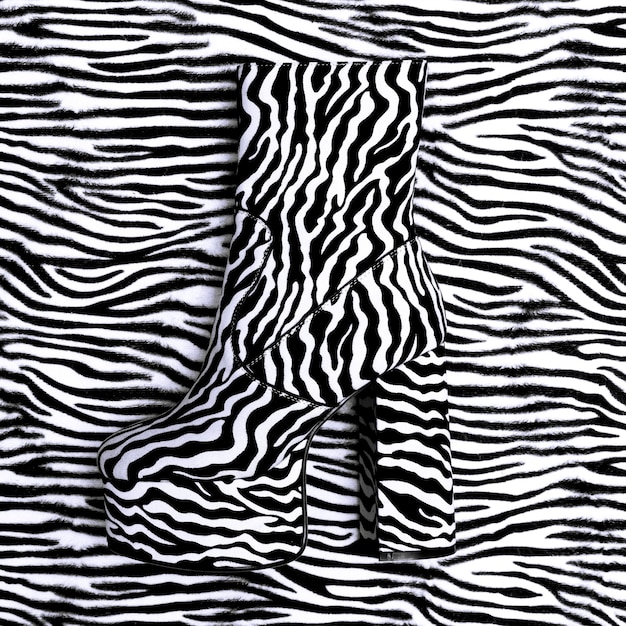 Stijlvolle laarzen met hak. Zebraprint. Mode dame concept. Platliggende kunst