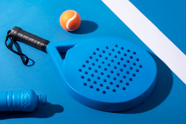 Photo still life of blue paddle equipment