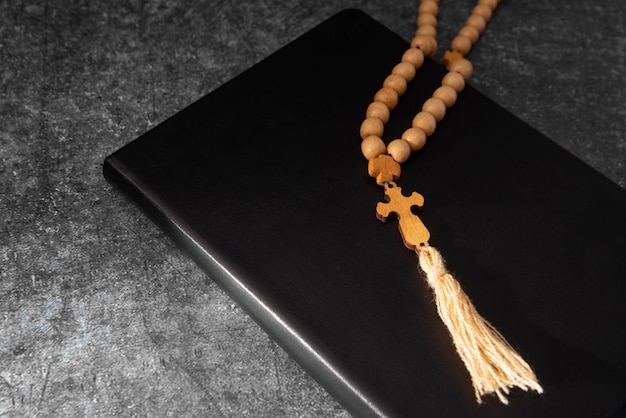 Photo still life of crucifix with book