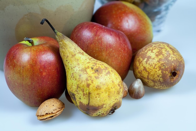 Still life display of Apples, Pears and nuts