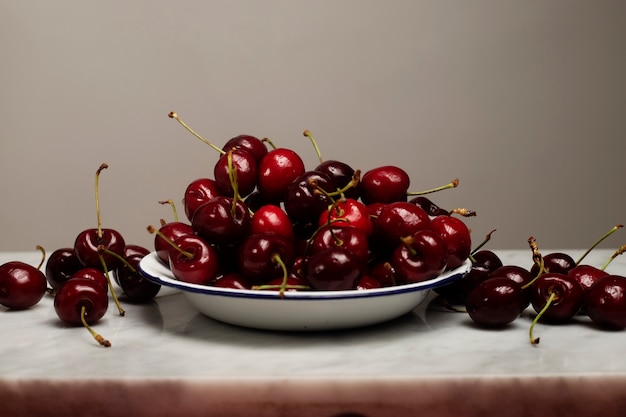 Still life plate with cherries in and out of it