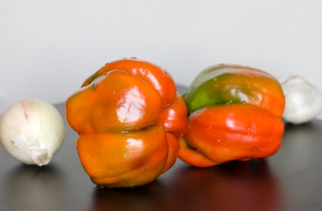 Still life of red peppers with garlick