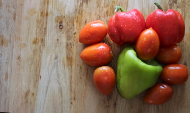 still life of red vegetables with green pepper