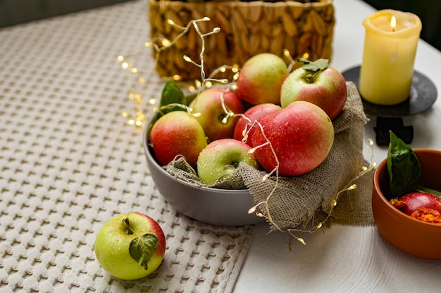 still life with apples in basket on table