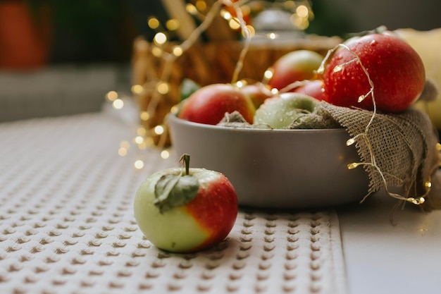 still life with apples in basket on table