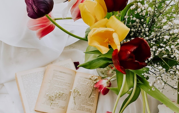 still life with a book and rose