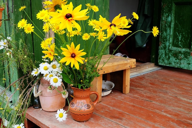 Still life with a bouquet of yellow rudbeckia