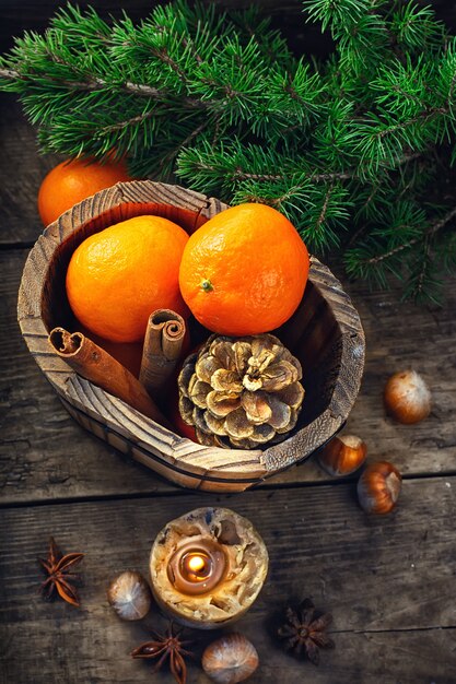 Still-life with candle and tangerines