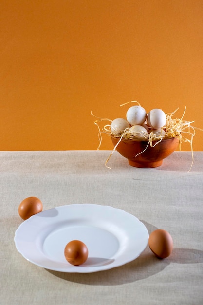 Still life with chicken eggs in plates