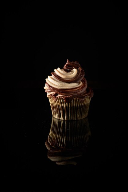 Still life with chocolate muffin with sugar