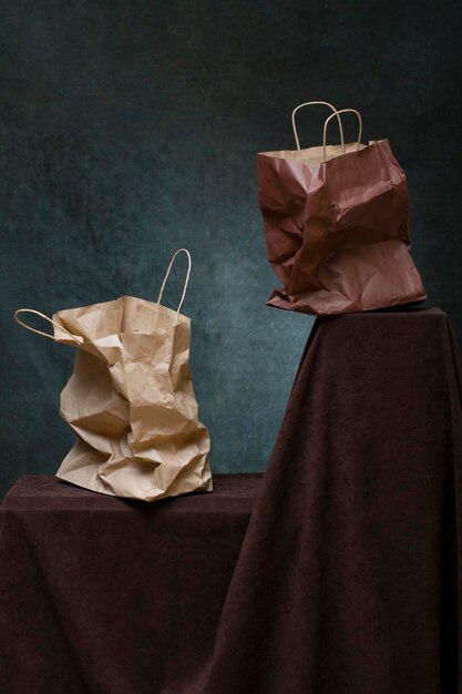 Photo still life with crumpled paper bags on the table