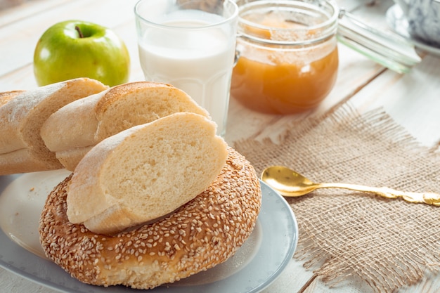 Still life with dairy products, milk, eggs, bread 