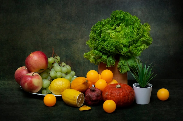 Still life with fruits and vegetables plants and balls