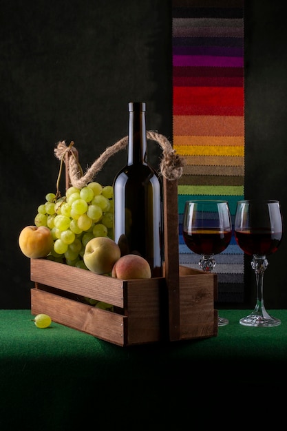 Still life with grapes and wine in glasses