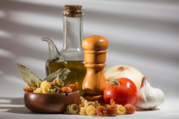 Still life with ingredients for cooking dry pasta