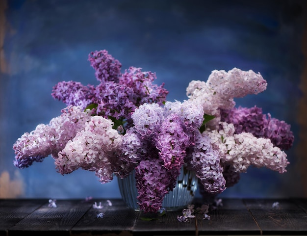 Still life with lilac flowers in a vase