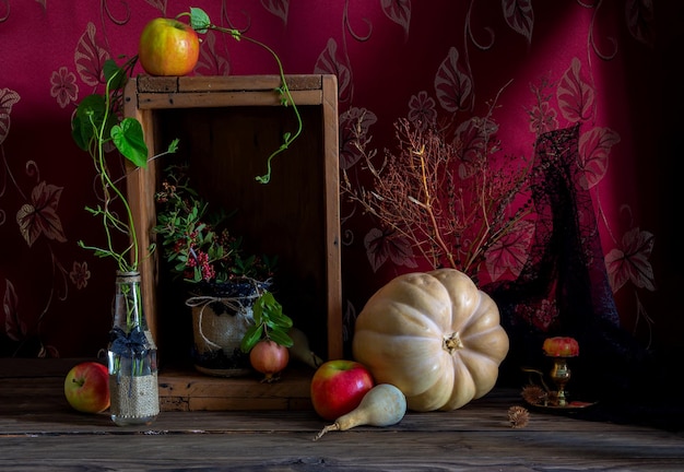 Still Life with pumpkin on wooden background