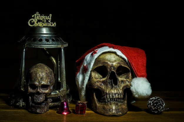 Still life with skull and present, santa is coming to town, dark concept