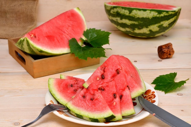 Still life with sliced watermelon in a rustic style