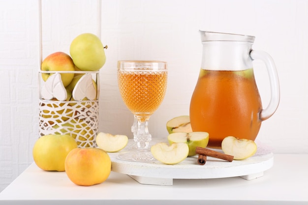 Still life with tasty apple cider and fresh apples