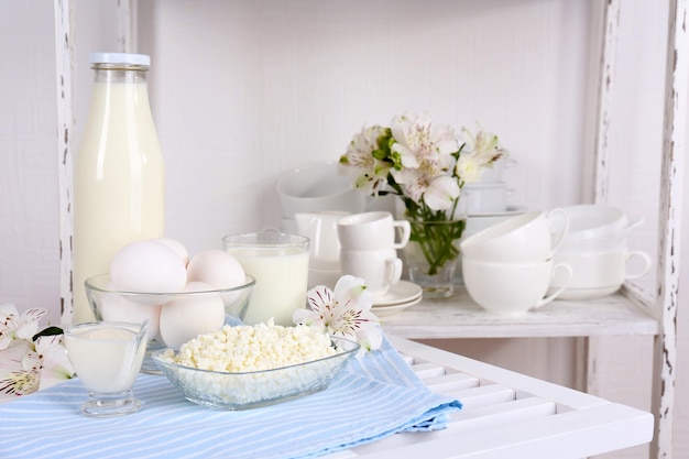 Still life with tasty dairy products on table