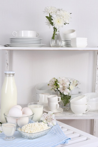 Still life with tasty dairy products on table