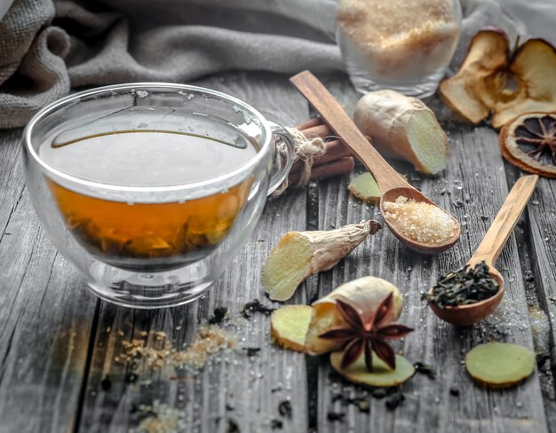 still life with transparent Cup of tea on wooden table