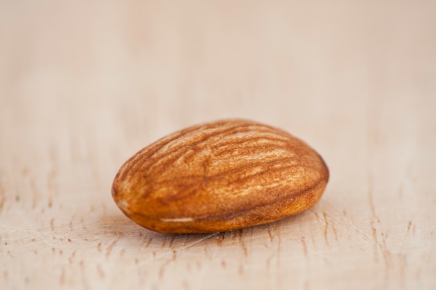 Still of a lonely almond nut