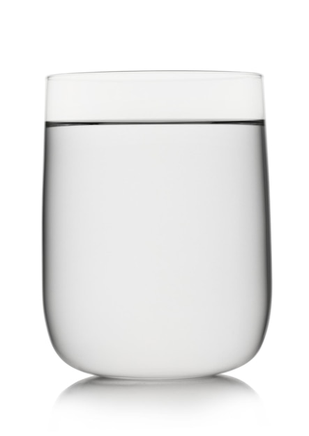 Still natural mineral water in large glass on white