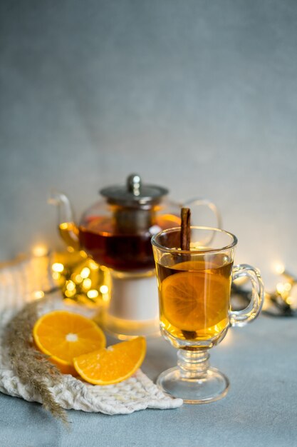 Stilllife A teapot and a cup of tea on the coffee table A cozy autumn concept