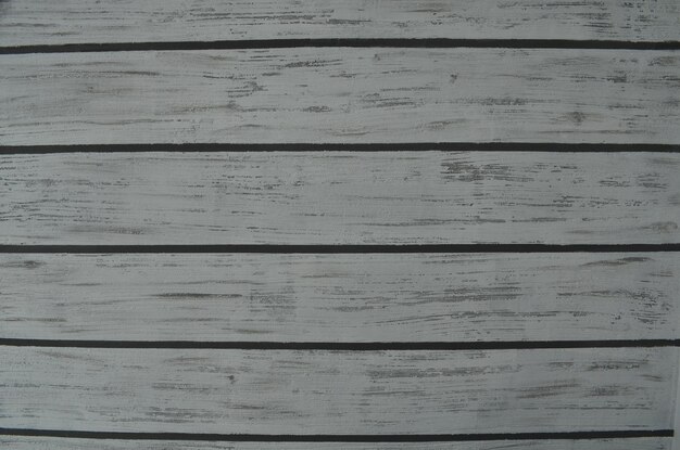 A stipy white and grey background texture