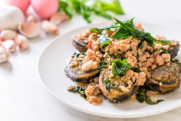 Stir-fried Century Egg and Minced Pork with Holy Basil Leaves