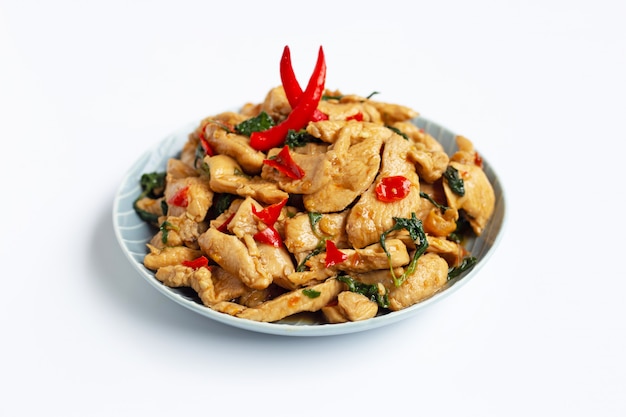 Stir-fried chicken with holy basil on white 