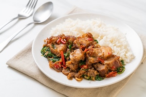 Stir-fried crispy pork belly and basil with rice