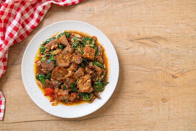 stir-fried crispy pork belly and basil