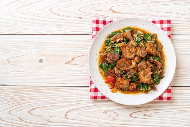 stir-fried crispy pork belly and basil